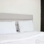 Stylish And Comfy 2Br Grand Asia Afrika Apartment By Travelio