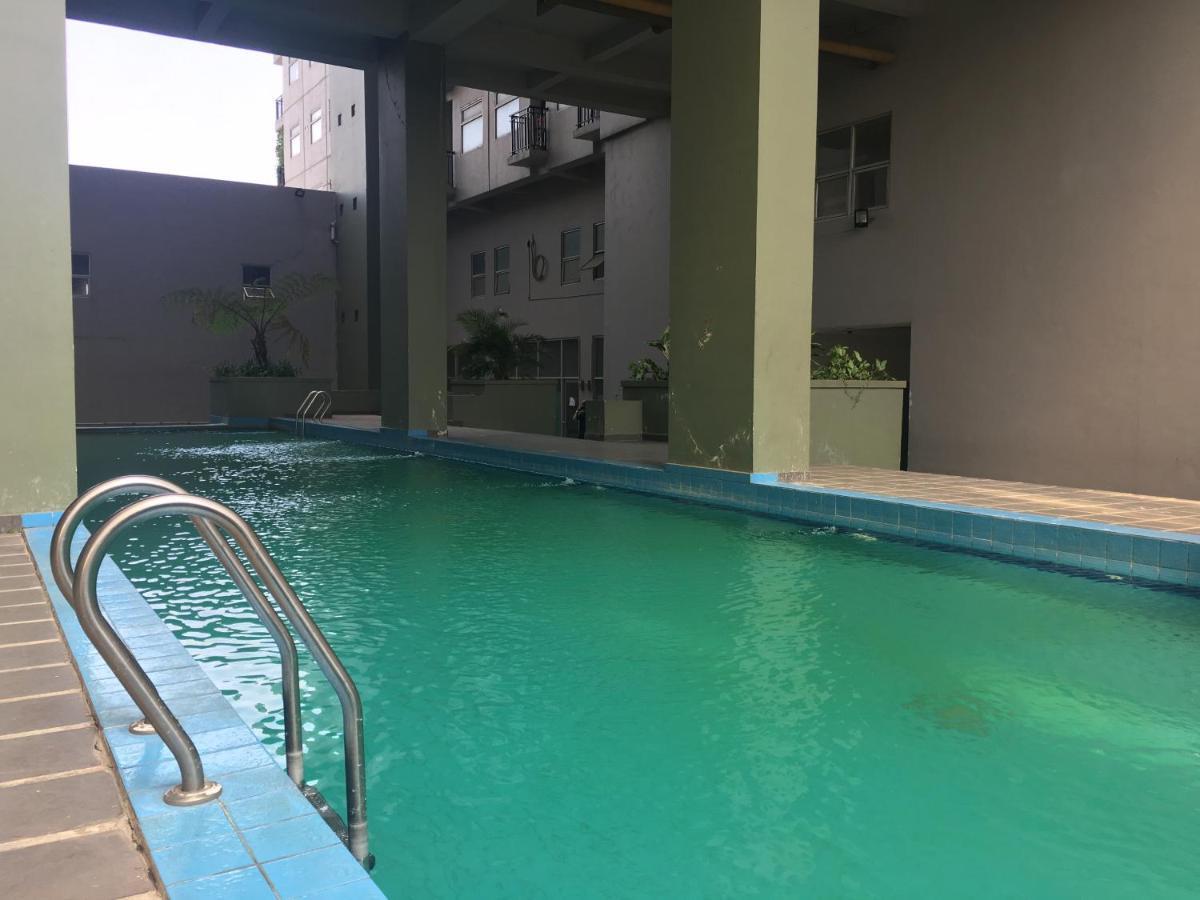 Apartemen Stylish And Comfy 2br Grand Afrika By Travelio