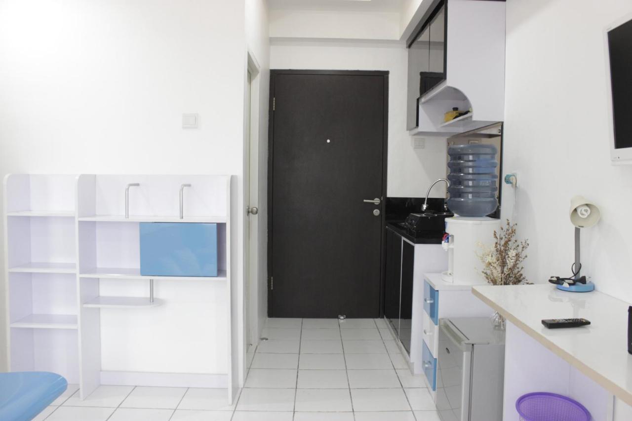 Apartemen Stylish And Comfy 2br Grand Afrika By Travelio