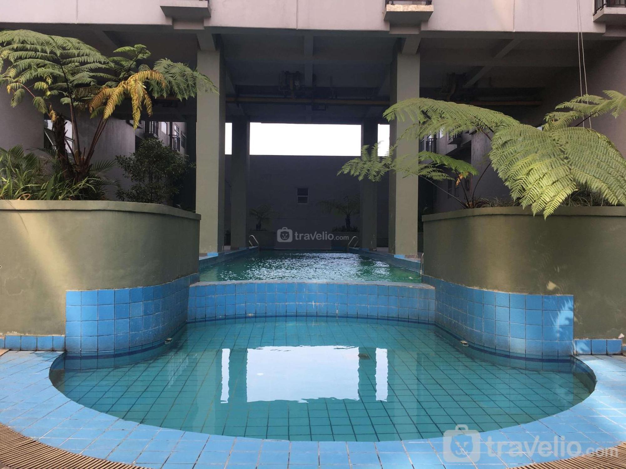 Stylish And Comfy 2br Grand Afrika By Travelio